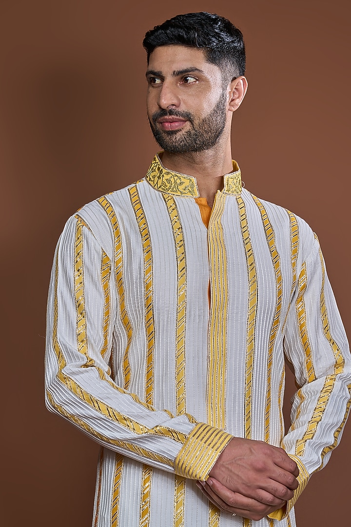 Off-White Cotton Zari Striped Textured Kurta Set by Kunal Anil Tanna at Pernia's Pop Up Shop