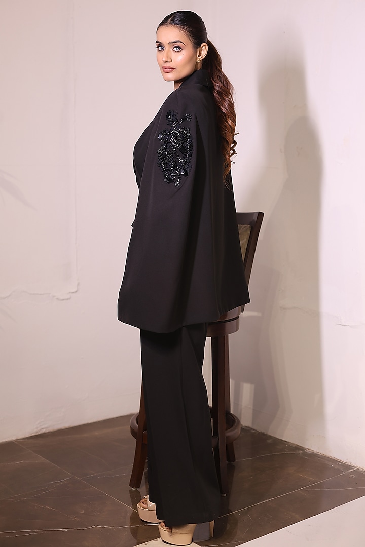 Black Banana Crepe Boota Hand Embroidered Cape Blazer Set by KANIKA VERMA at Pernia's Pop Up Shop