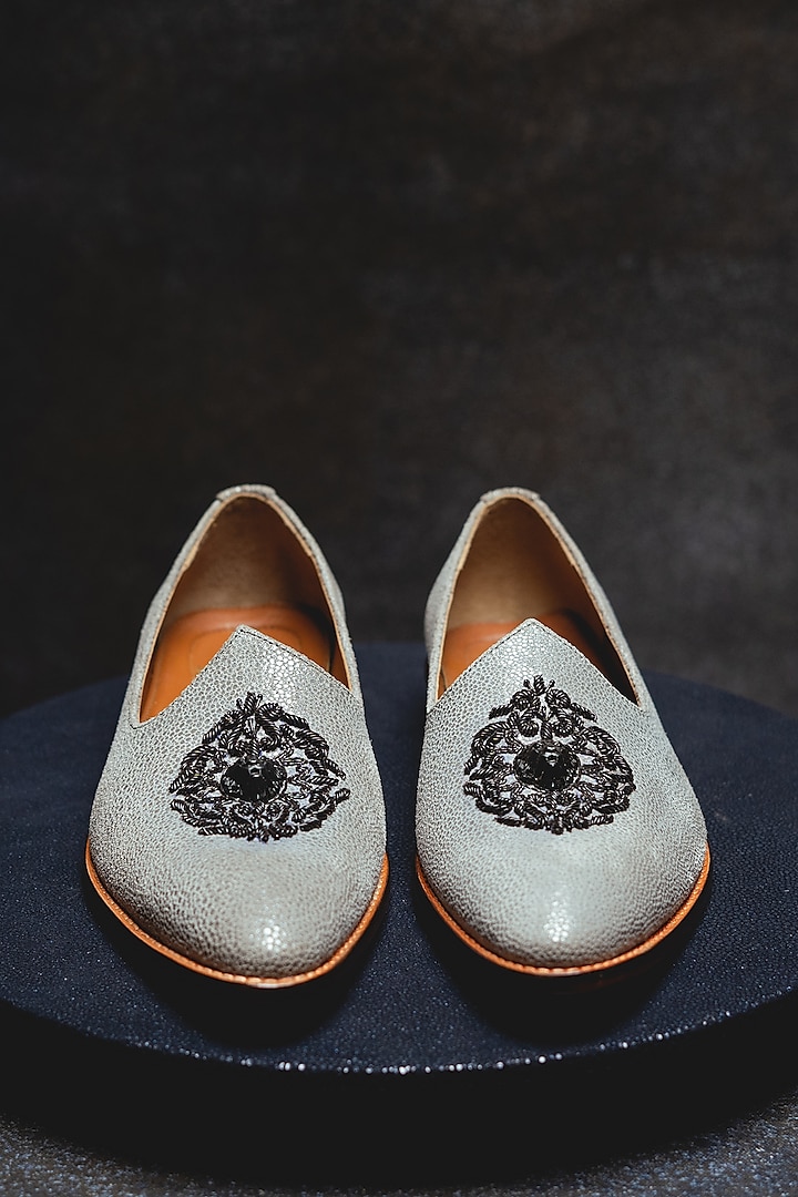 White Embroidered Juttis by Kavith