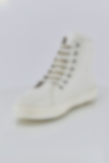 Pure White Leather Sneakers by Kavith