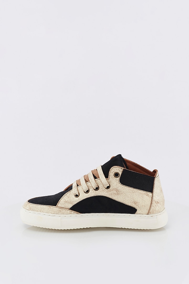 Off White & Black Calf Hair Sneakers by Kavith at Pernia's Pop Up Shop