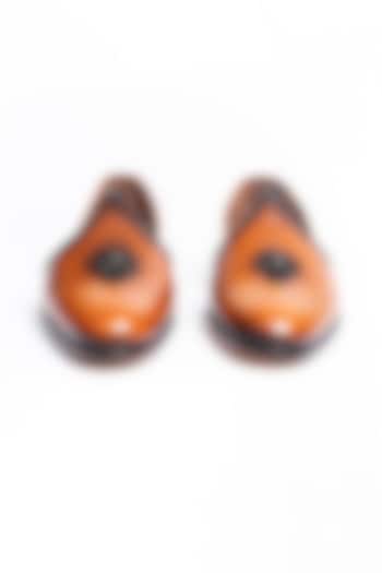 Brown Leather Juttis With Lion Ornamentation by Kavith at Pernia's Pop Up Shop