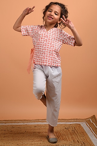 Peach Printed Top For Girls by KALP