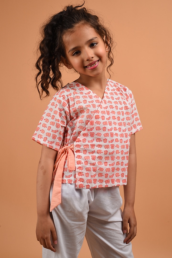 Peach Printed Top For Girls by KALP at Pernia's Pop Up Shop