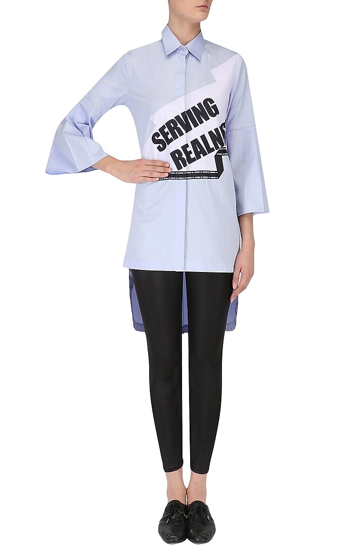 Powder blue Serving Realness shirt available only at Pernia's Pop Up Shop.