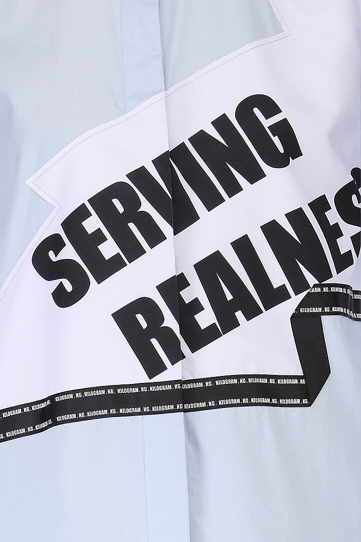 Powder blue Serving Realness shirt available only at Pernia's Pop Up Shop.