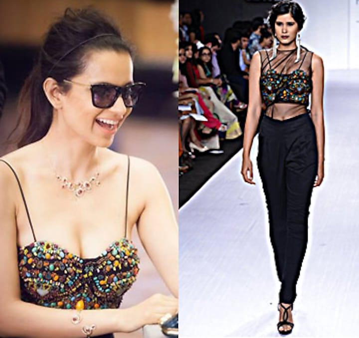 Black body suit with encrusted bustier and trousers available only at Pernia's Pop-Up Shop.