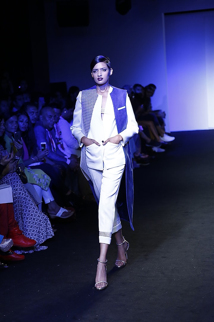 White bandage blocked slim pants available only at Pernia's Pop Up Shop.