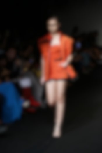 Orange and black bandage blocked playsuit available only at Pernia's Pop Up Shop.