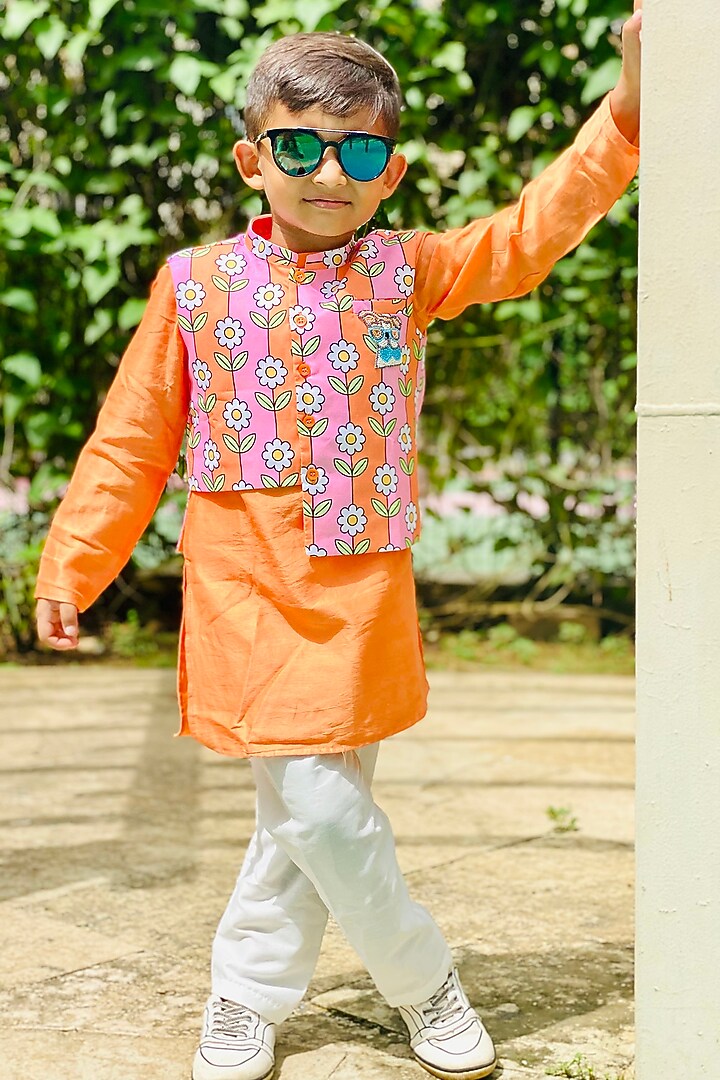 Orange Kurta Set With Printed Bundi Jacket For Boys by Kirti Agarwal Pret n Couture at Pernia's Pop Up Shop