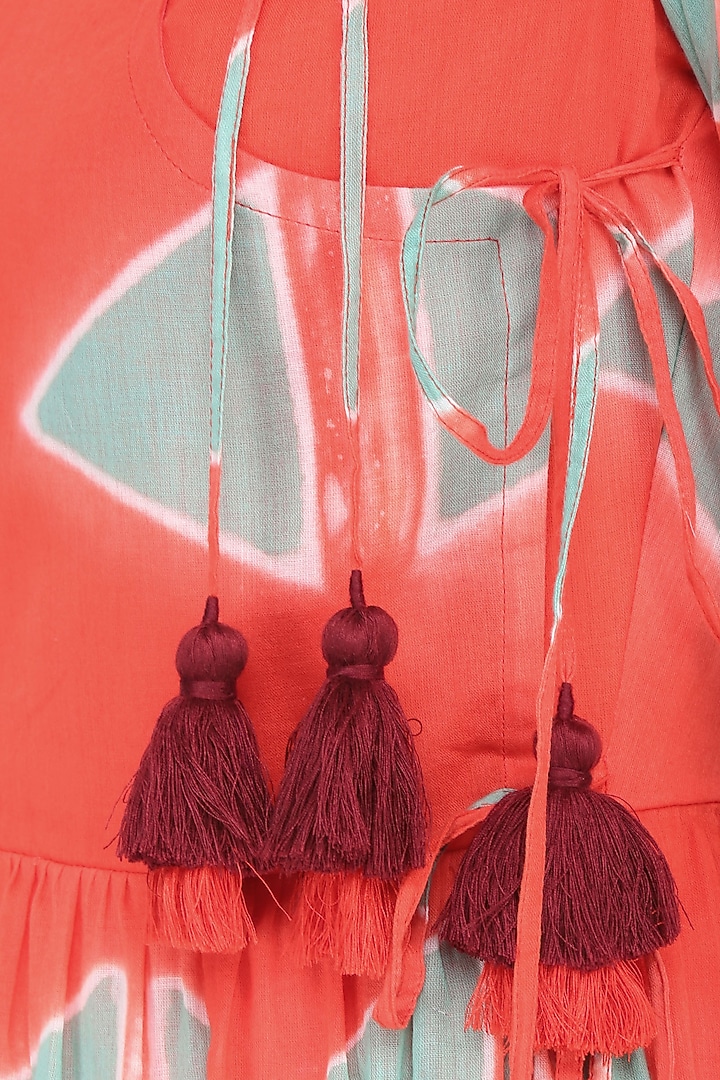 Orange clamp dyed crossover style dress available only at Pernia's Pop Up Shop.