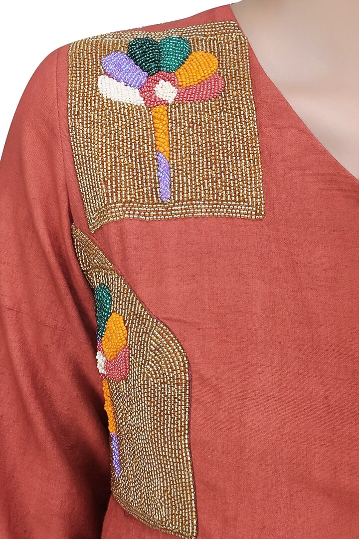 Tangerine embroidered calf length dress available only at Pernia's Pop Up Shop.