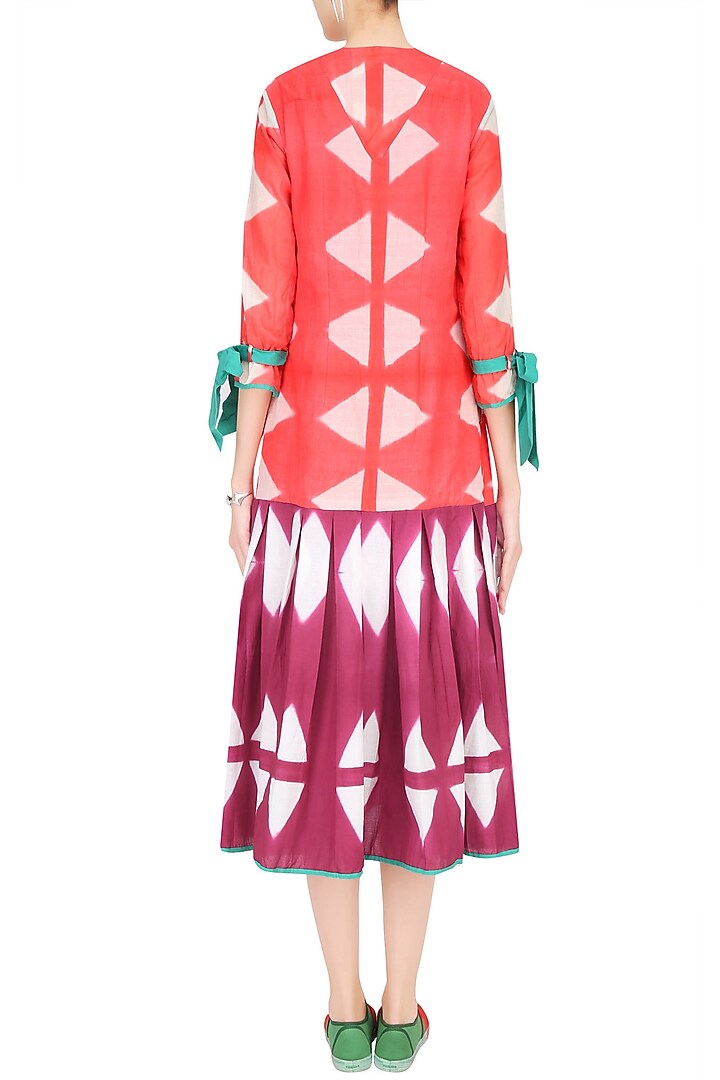 Pink and orange clamp dyed pleated calf length dress available only at Pernia's Pop Up Shop.