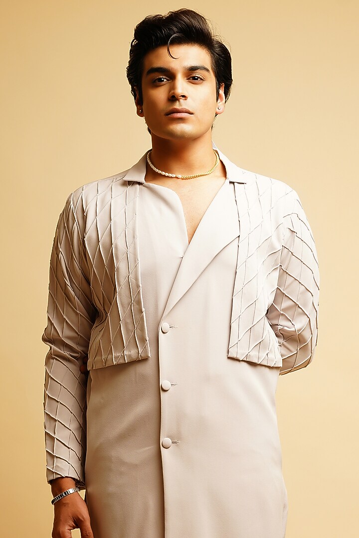 Chalk White Lapel Kurta Set With Jacket by KHUSHBOO CHUGH MEN at Pernia's Pop Up Shop