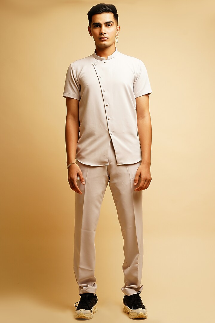Chalk White Crepe Pant Set With Jacket by KHUSHBOO CHUGH MEN at Pernia's Pop Up Shop