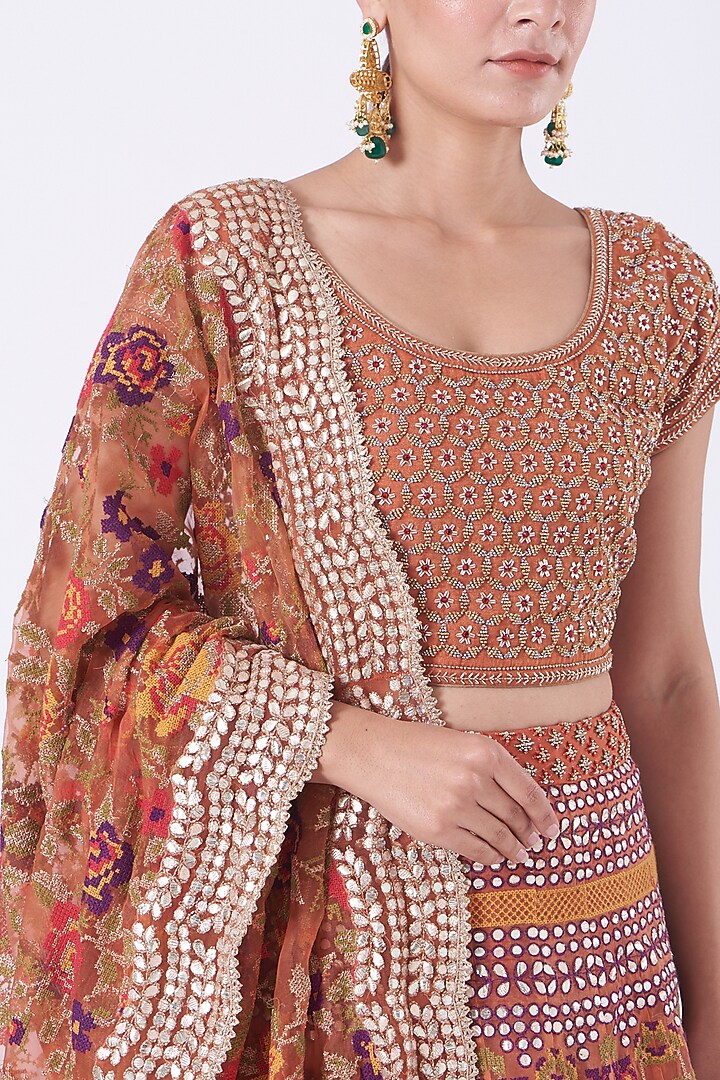 Rust Red Embroidered Wedding Lehenga Set by Kavita Bhartia at Pernia's Pop Up Shop