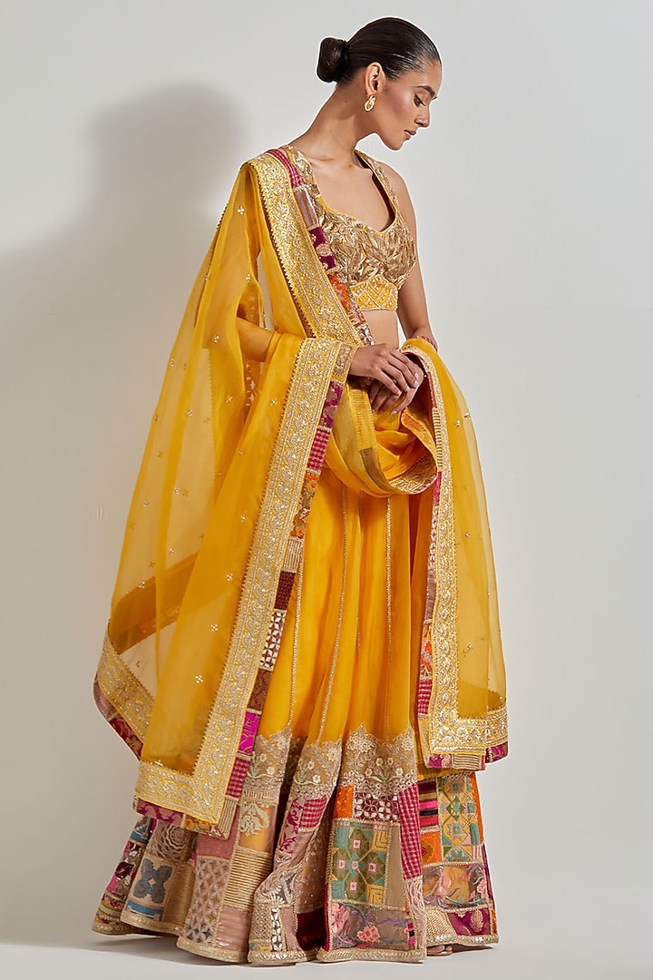 Yellow Organza Patchwork Wedding Lehenga Set by Kavita Bhartia at Pernia's Pop Up Shop