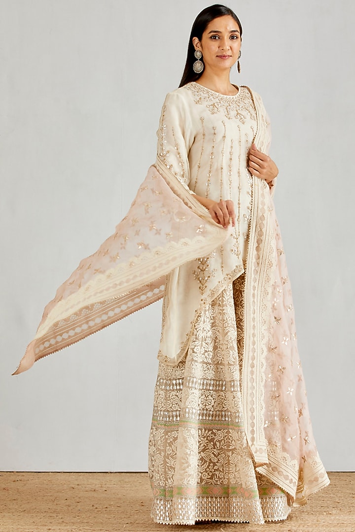 Ivory Embellished Bridal Sharara Set by Kavita Bhartia at Pernia's Pop Up Shop