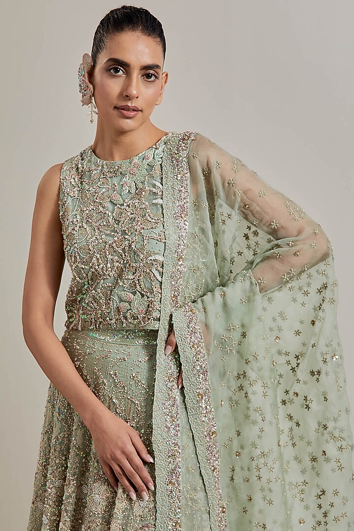 Green Net & Organza Hand Embellished Bridal Lehenga Set by Kavita Bhartia at Pernia's Pop Up Shop