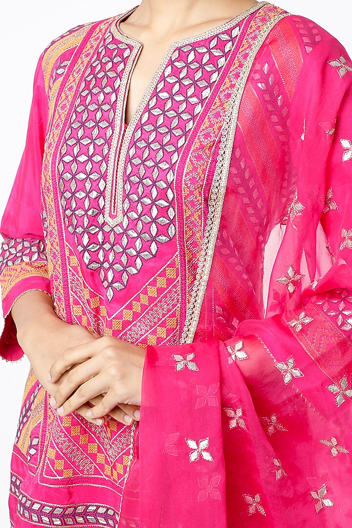Hot Pink Tiered Wedding Sharara Set With Embroidered Dupatta by Kavita Bhartia at Pernia's Pop Up Shop