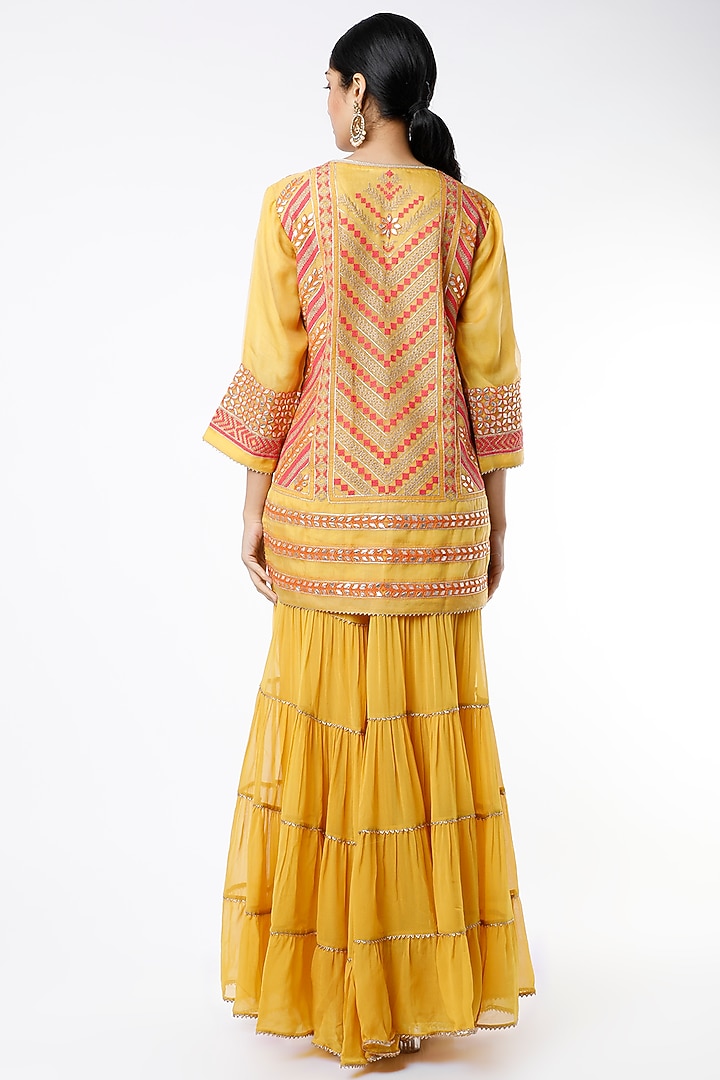 Yellow Tiered Wedding Sharara Set With Embroidered Dupatta by Kavita Bhartia at Pernia's Pop Up Shop
