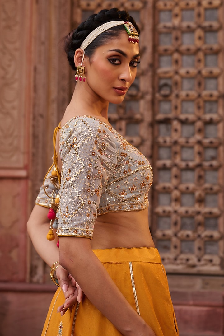Mustard Yellow Shimmer Tissue Silk Mirror Embroidered Wedding Lehenga Set by Kapda Dori at Pernia's Pop Up Shop