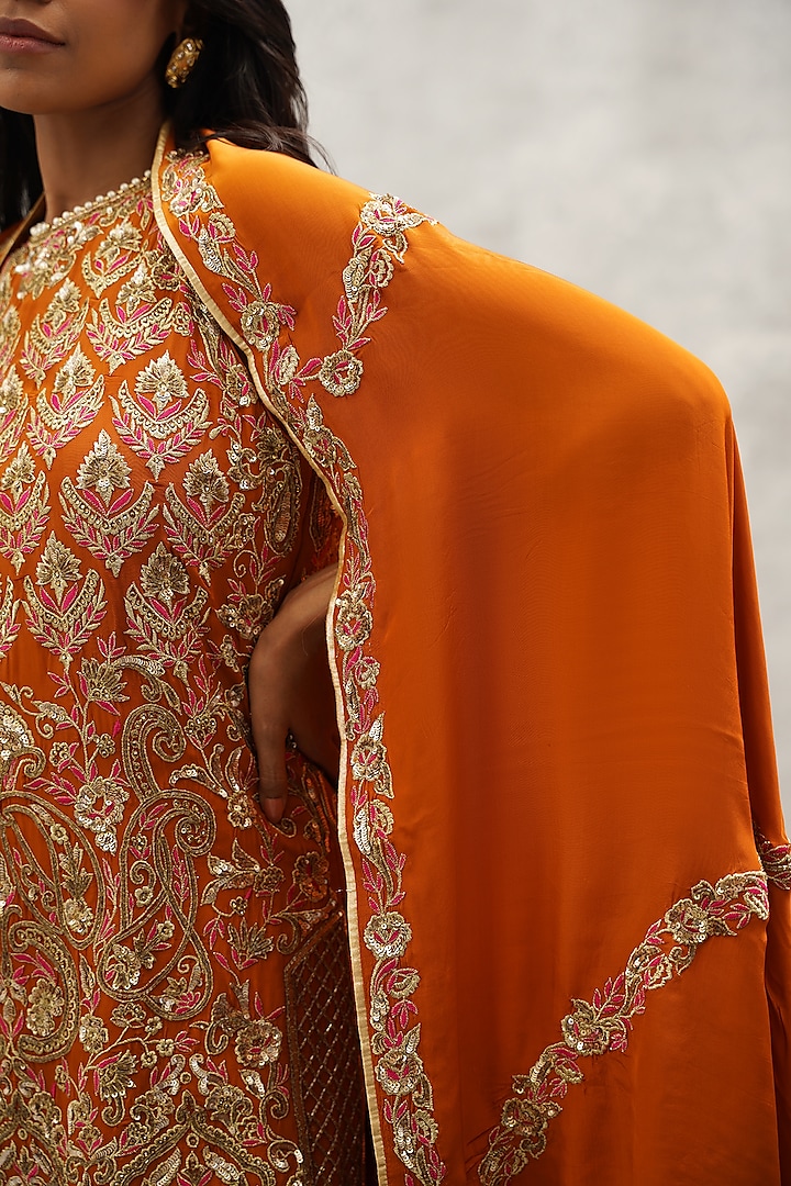 Rust Orange Crepe Hand & Machine Embroidered Peplum Kurta Set by Kapda Dori at Pernia's Pop Up Shop