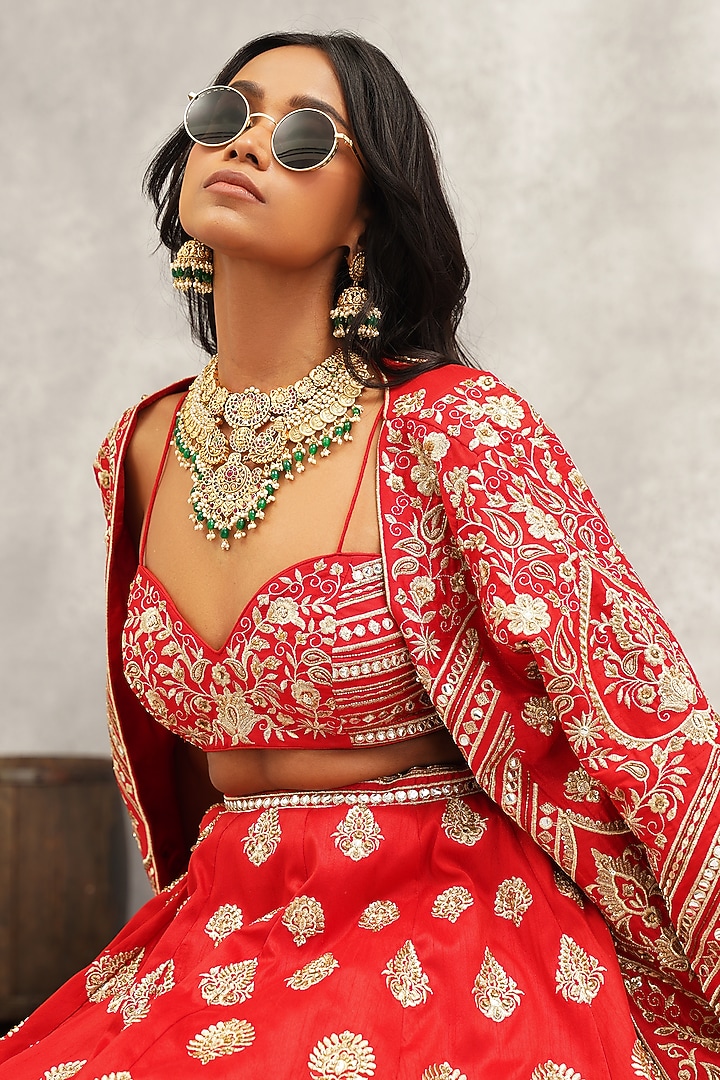 Red Dupion Silk Mirror Hand & Machine Embroidered Jacket Bridal Lehenga Set by Kapda Dori at Pernia's Pop Up Shop