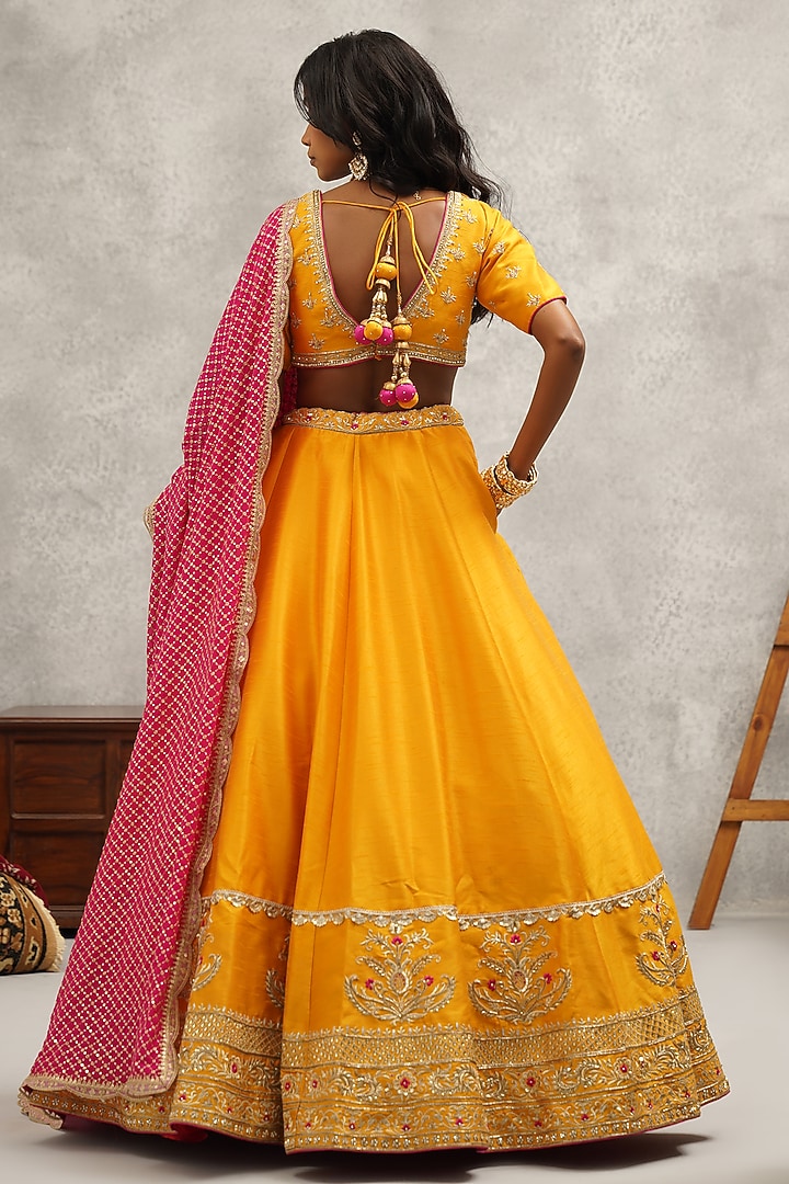 Mustard Dupion Silk Hand & Machine Embroidered Wedding Lehenga Set by Kapda Dori at Pernia's Pop Up Shop