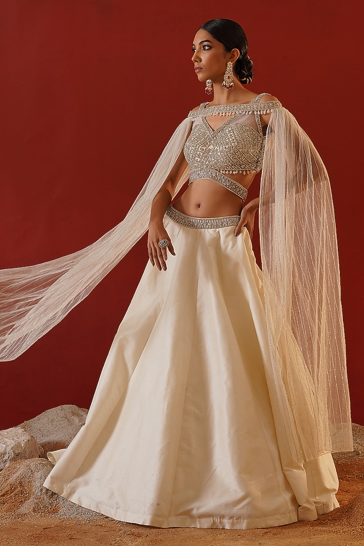 Ivory Dupion Silk & Net Jacket Wedding Lehenga Set by Kapda Dori at Pernia's Pop Up Shop