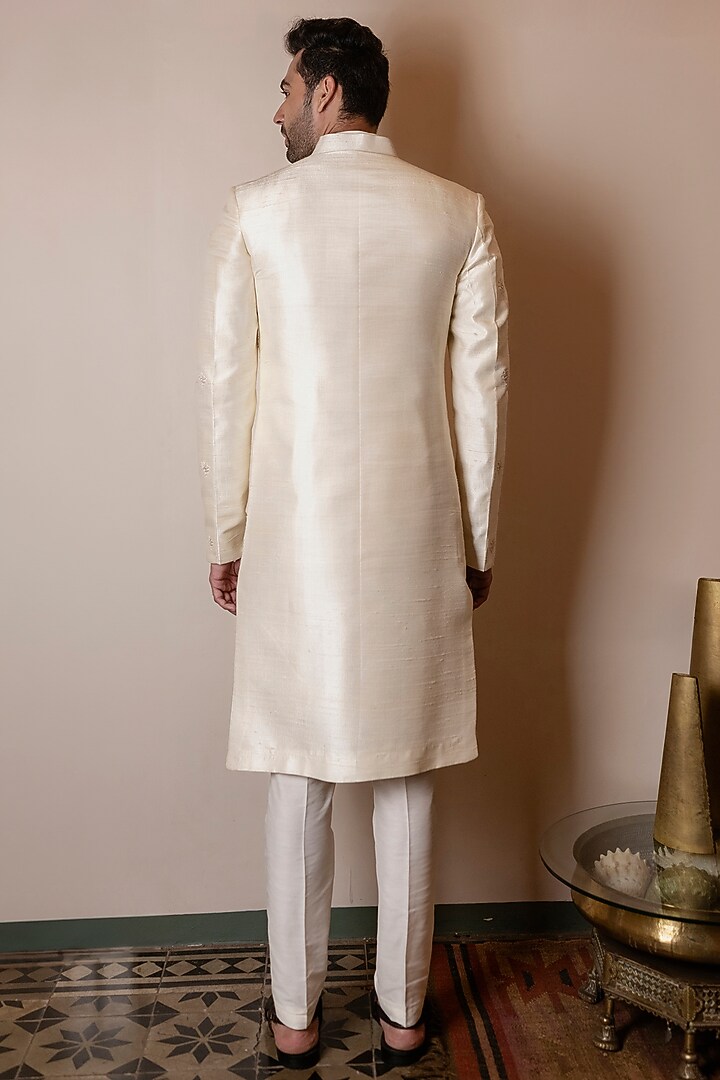 Ivory Raw Silk Resham Embroidered Wedding Sherwani by Kaleidoscope at Pernia's Pop Up Shop