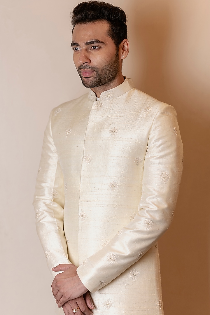 Ivory Raw Silk Resham Embroidered Wedding Sherwani by Kaleidoscope at Pernia's Pop Up Shop