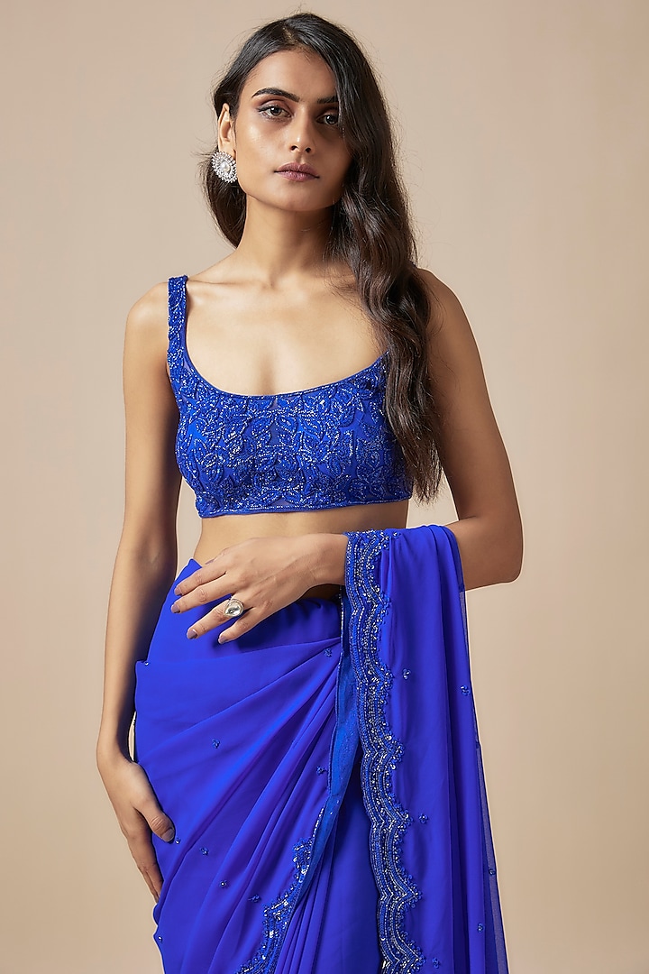 Blue Georgette Cutdana Embroidered Wedding Saree Set by Kashmiraa at Pernia's Pop Up Shop