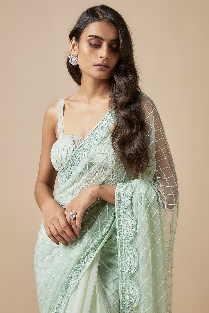 Green Net Cutdana Embroidered Reception Saree Set by Kashmiraa at Pernia's Pop Up Shop