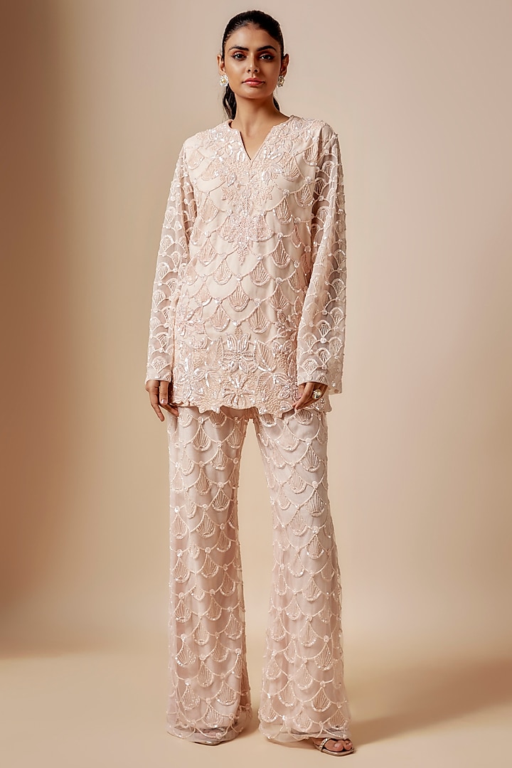 Peach Net Cutdana Hand Embellished Kurta Set by Kashmiraa at Pernia's Pop Up Shop