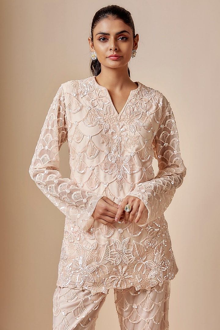 Peach Net Cutdana Hand Embellished Kurta Set by Kashmiraa at Pernia's Pop Up Shop