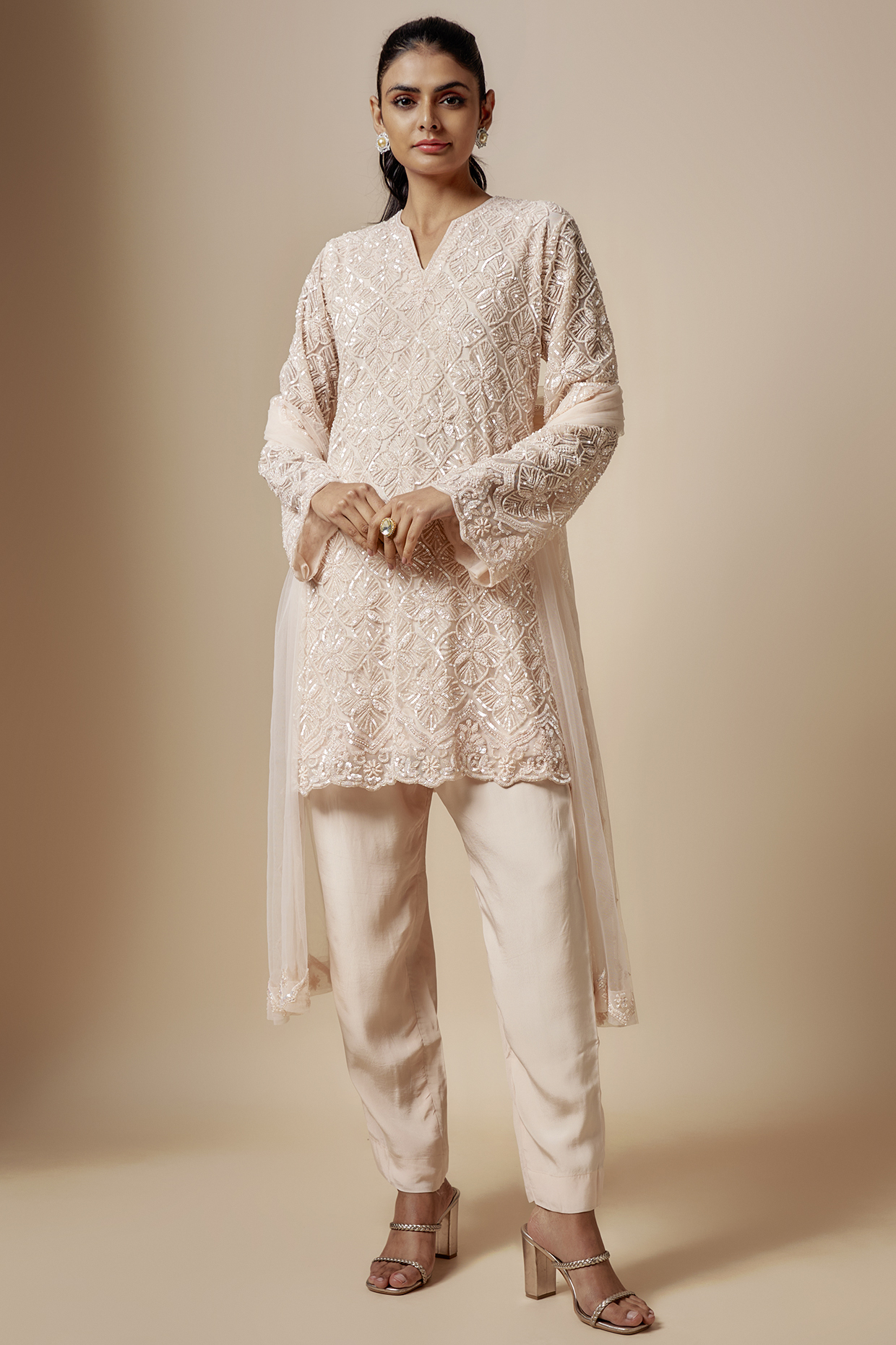 Peach Net Cutdana Hand Embellished Kurta Set by Kashmiraa at Pernia's Pop Up Shop