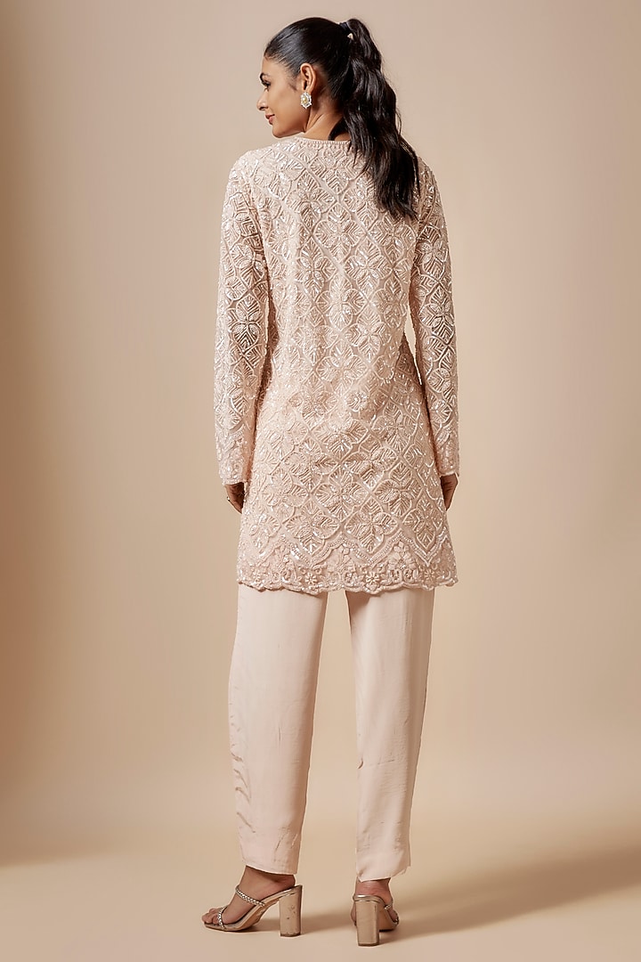 Peach Net Cutdana Hand Embellished Kurta Set by Kashmiraa at Pernia's Pop Up Shop
