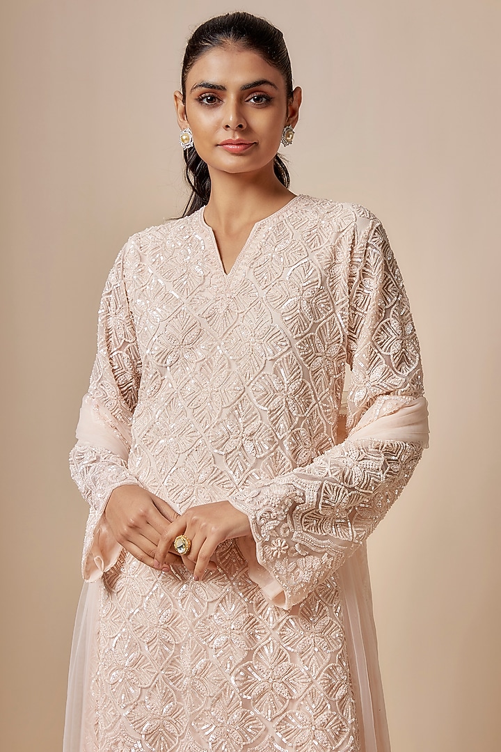 Peach Net Cutdana Hand Embellished Kurta Set by Kashmiraa at Pernia's Pop Up Shop