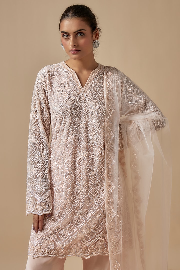Peach Net Cutdana Hand Embellished Kurta Set by Kashmiraa at Pernia's Pop Up Shop