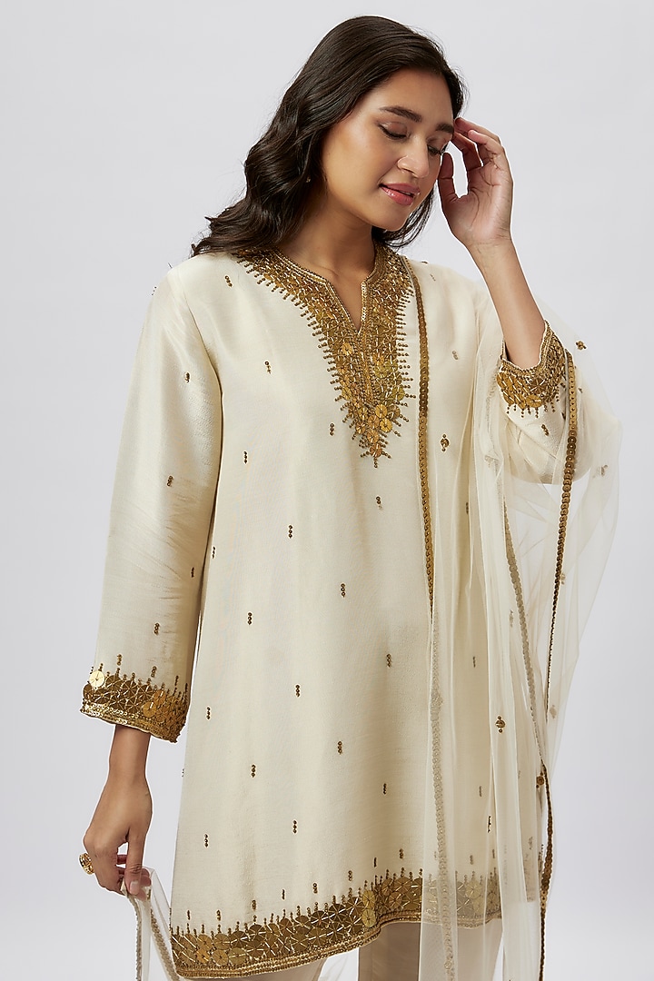 Beige Tissue Coin Embroidered Short Kurta Set by Kashmiraa at Pernia's Pop Up Shop