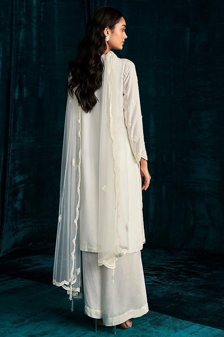 Ivory Mul Silk Cutdana Embroidered Kurta Set by Kashmiraa at Pernia's Pop Up Shop
