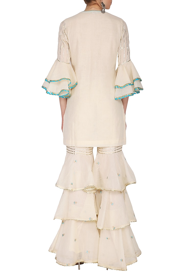 Off White Embroidered & Printed Layered Gharara Set by KAIA at Pernia's Pop Up Shop