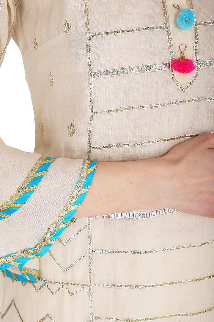 Off White Embroidered & Printed Layered Gharara Set by KAIA at Pernia's Pop Up Shop