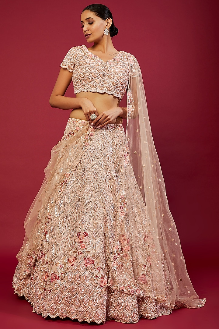 Peach Net Sequins Embellished Lehenga Set by Kalighata