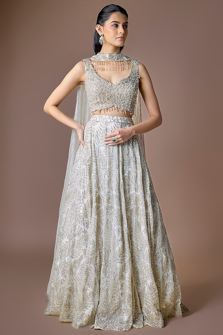Ivory Net Cutdana Embellished Bridal Lehenga Set by Kalighata at Pernia's Pop Up Shop
