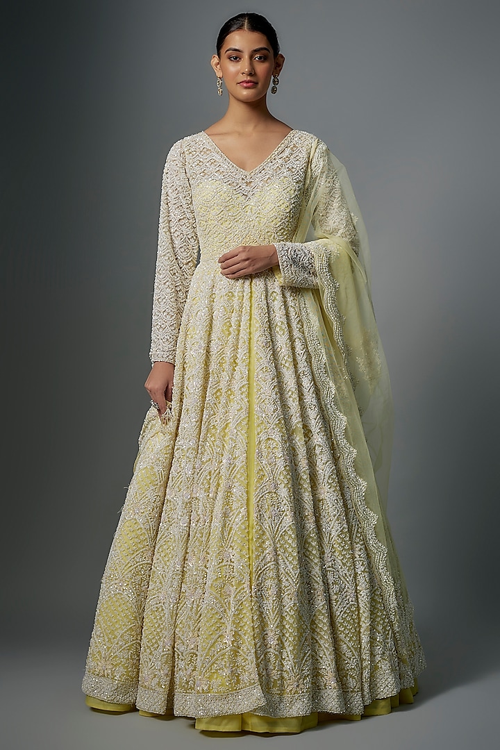 Pastel Yellow Raw Silk Hand Embroidered Jacket Bridal Lehenga Set by Kalighata at Pernia's Pop Up Shop