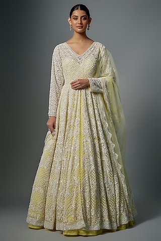 Pastel Yellow Raw Silk Hand Embroidered Jacket Lehenga Set by Kalighata