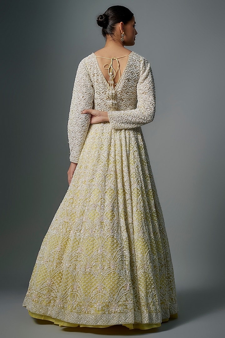 Pastel Yellow Raw Silk Hand Embroidered Jacket Bridal Lehenga Set by Kalighata at Pernia's Pop Up Shop