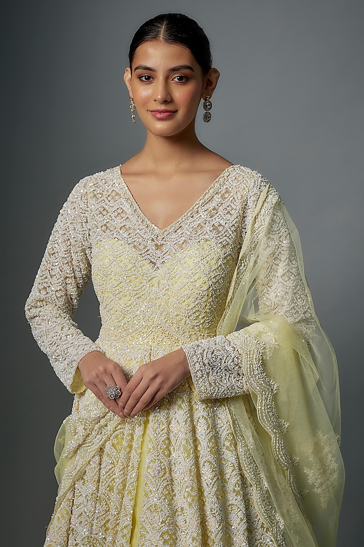Pastel Yellow Raw Silk Hand Embroidered Jacket Bridal Lehenga Set by Kalighata at Pernia's Pop Up Shop